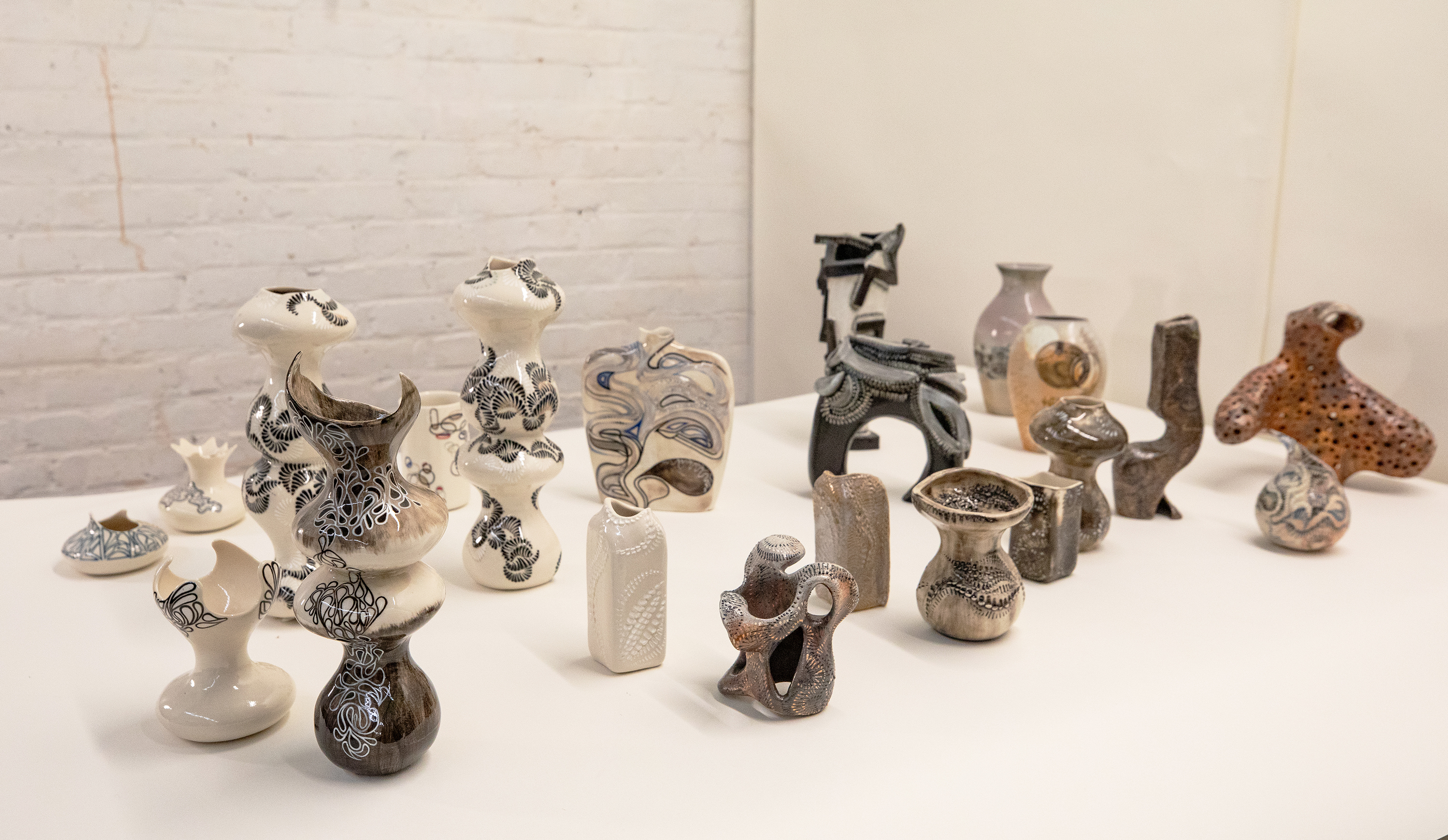 an array of porcelain and clay pieces by grad student Katharine Frank