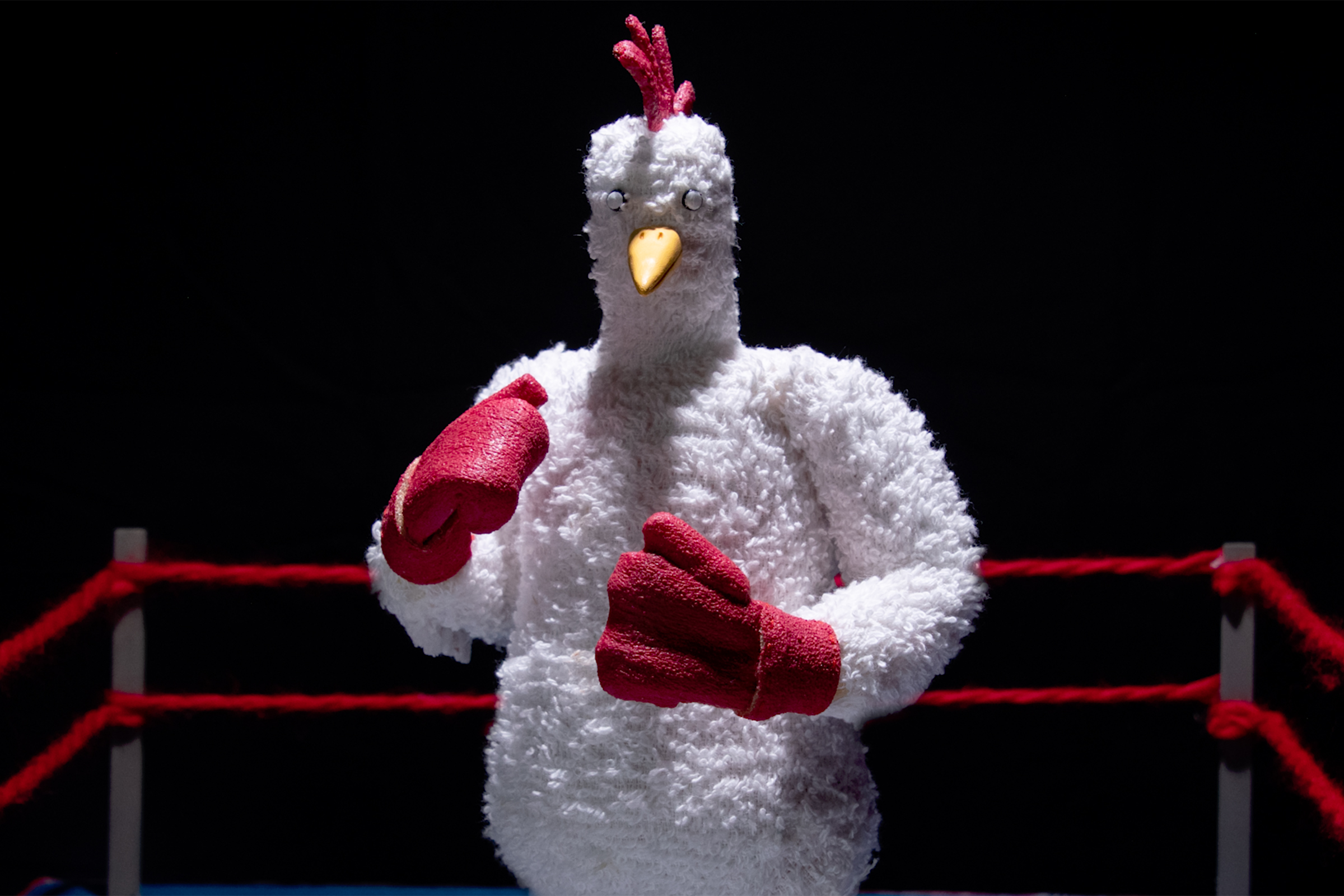 animated chicken in boxing gloves
