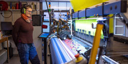 Textiles tech Holly Spenner watches the speedy new Jacquard loom at work