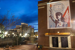 Image by Shepard Fairey 92 IL projected on RISD building