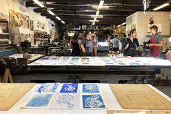 Students work in a printshop in venice