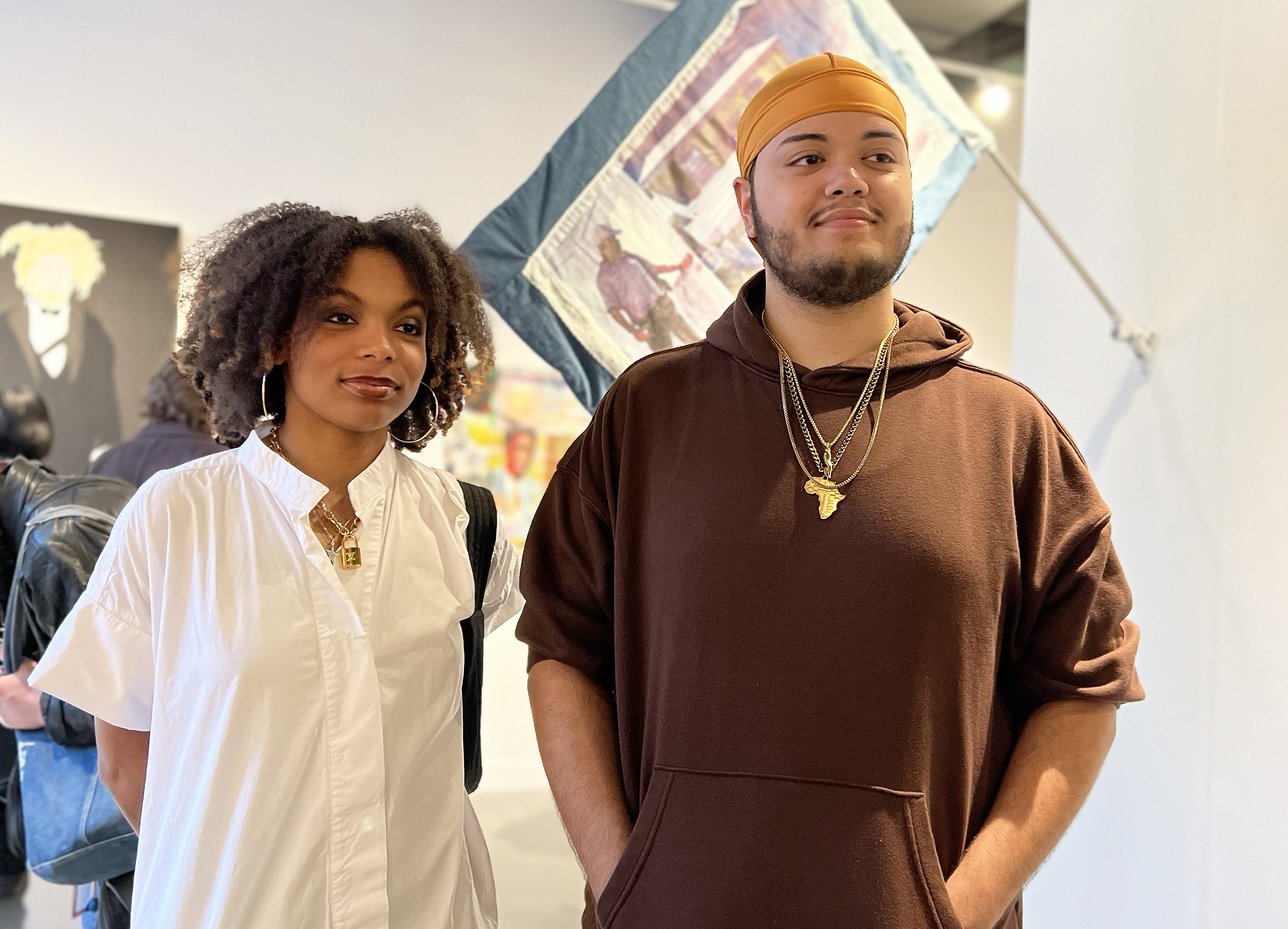 curators Amadi Williams and Prophet in the gallery