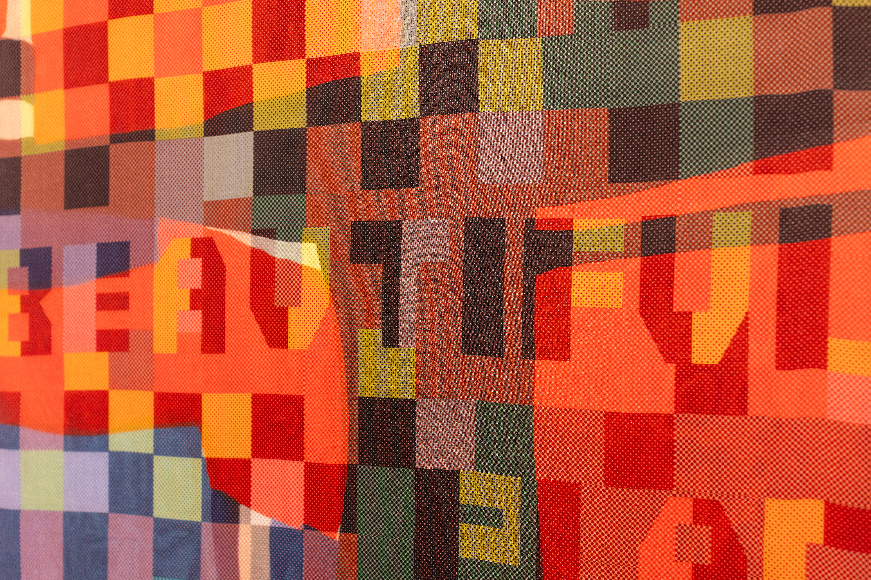 brightly colored textile with a hidden message of hope