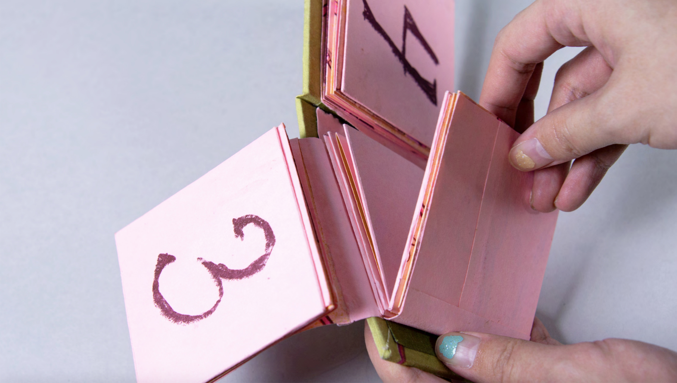 tiny artist book that opens up into a poster