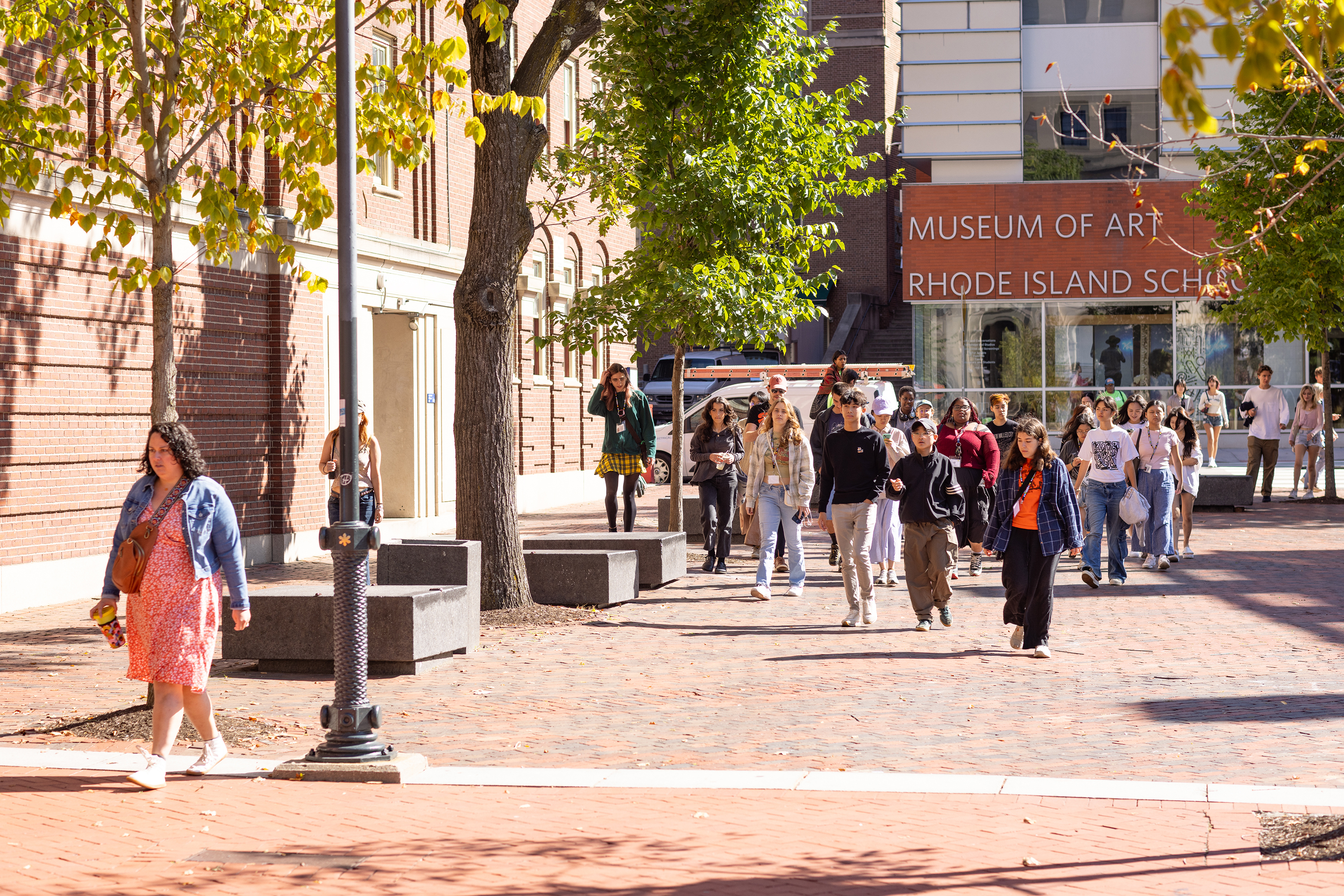 students crossing Market Square en route to Convocation 2024 in the RISD Auditorium