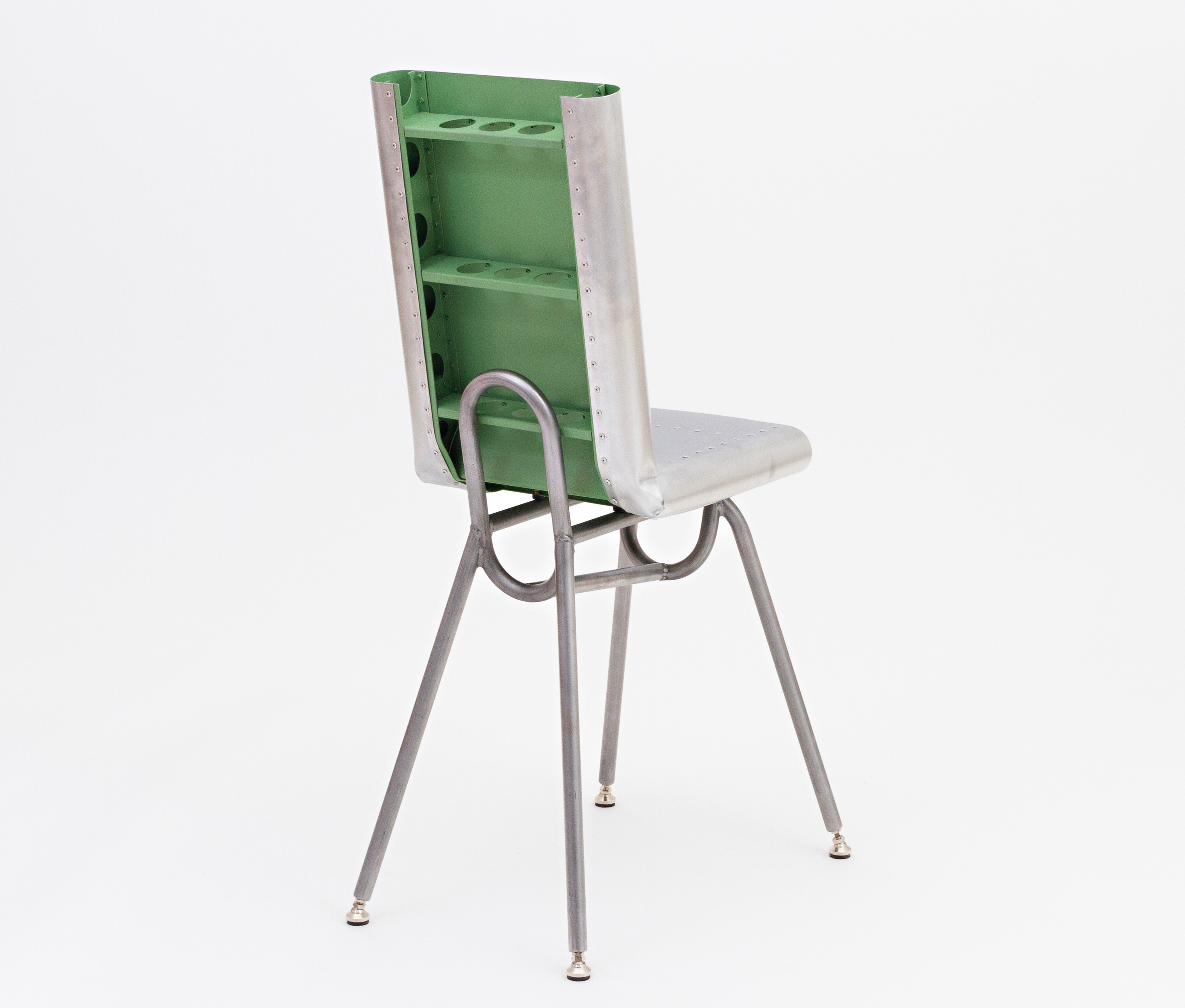 back view of metal chair showing unusual construction