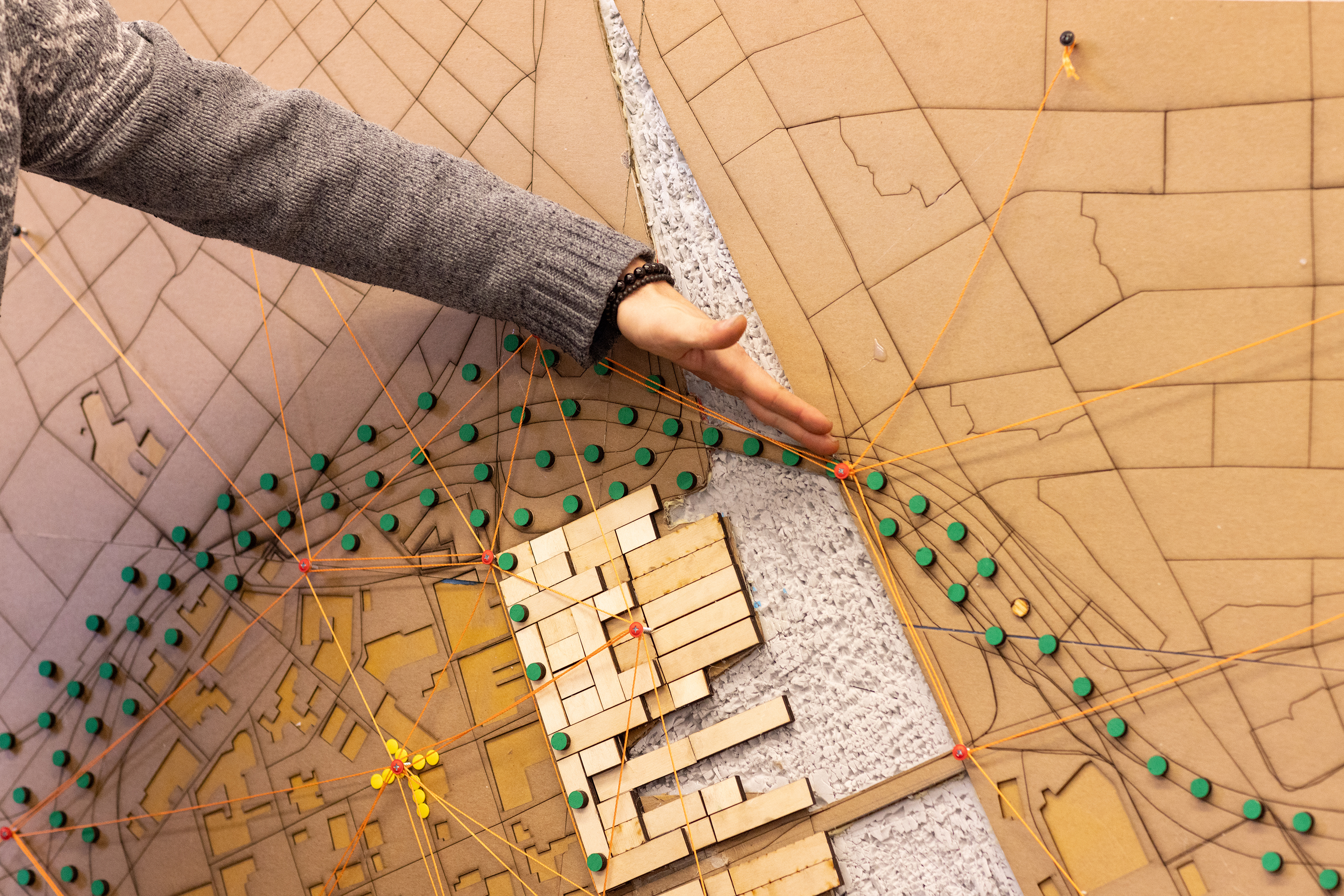 a wooden model showing proposed landscape design plans for the Jewelry District