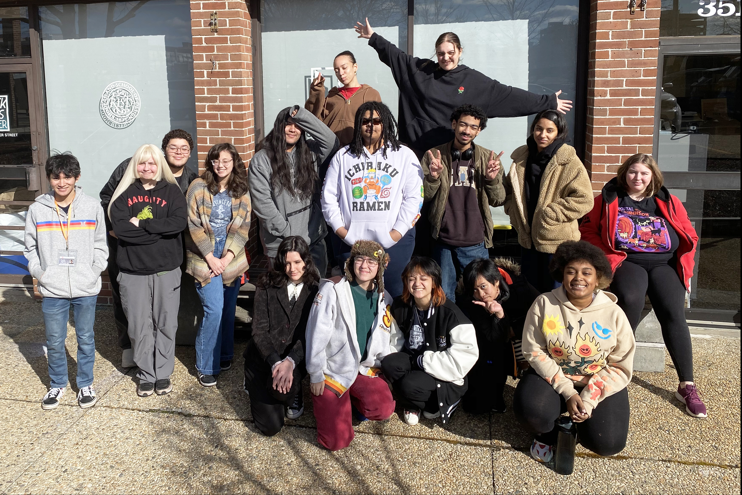 POD graduating seniors pose in front of the studio on South Water Street
