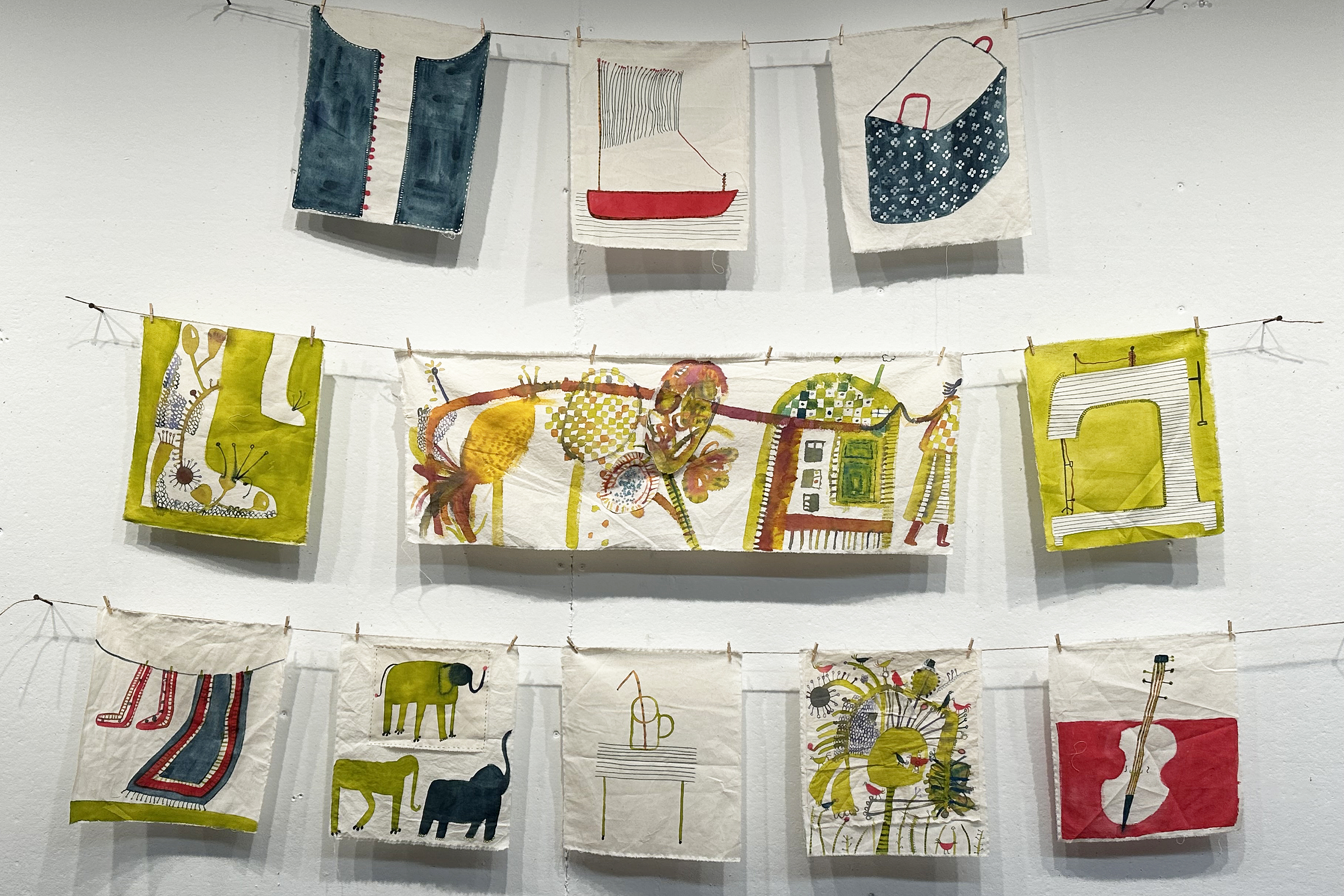 colorful illustrations hanging on strings