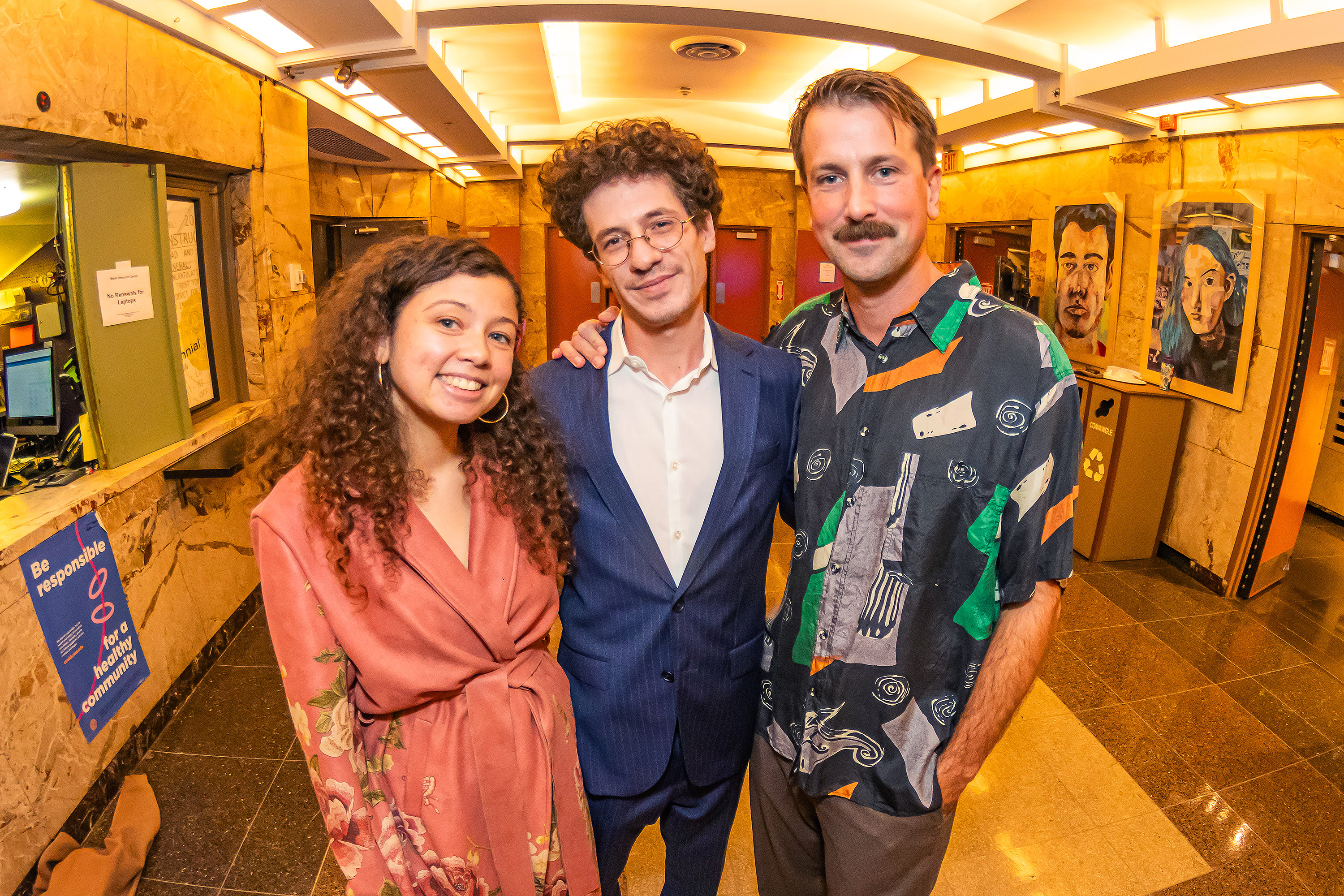 Lynsea Montanari, Gaia and Nick Platzer pose in the RISD Auditorium lobby after participating in a panel discussion