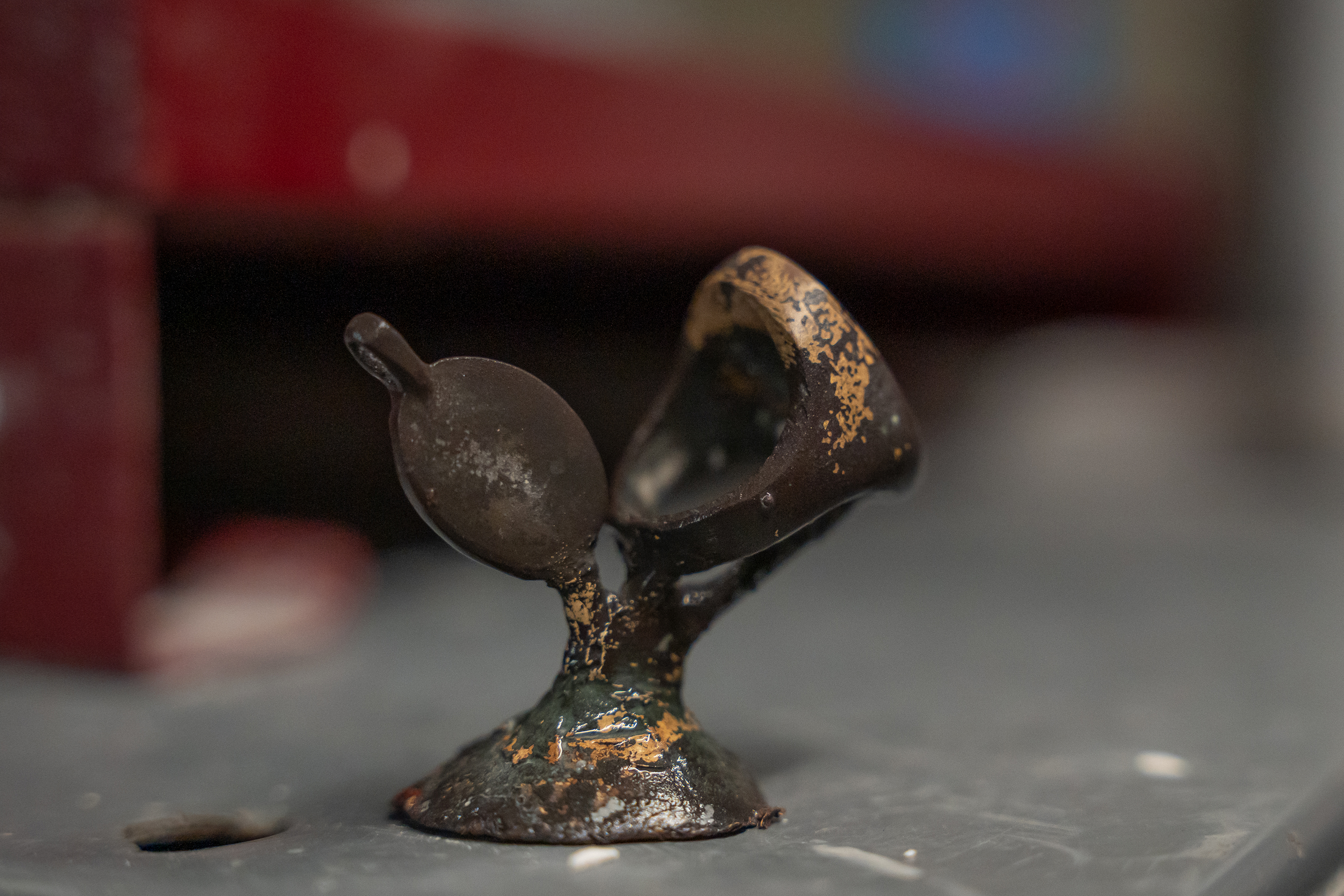 closeup of the metal cast used to create a signet ring