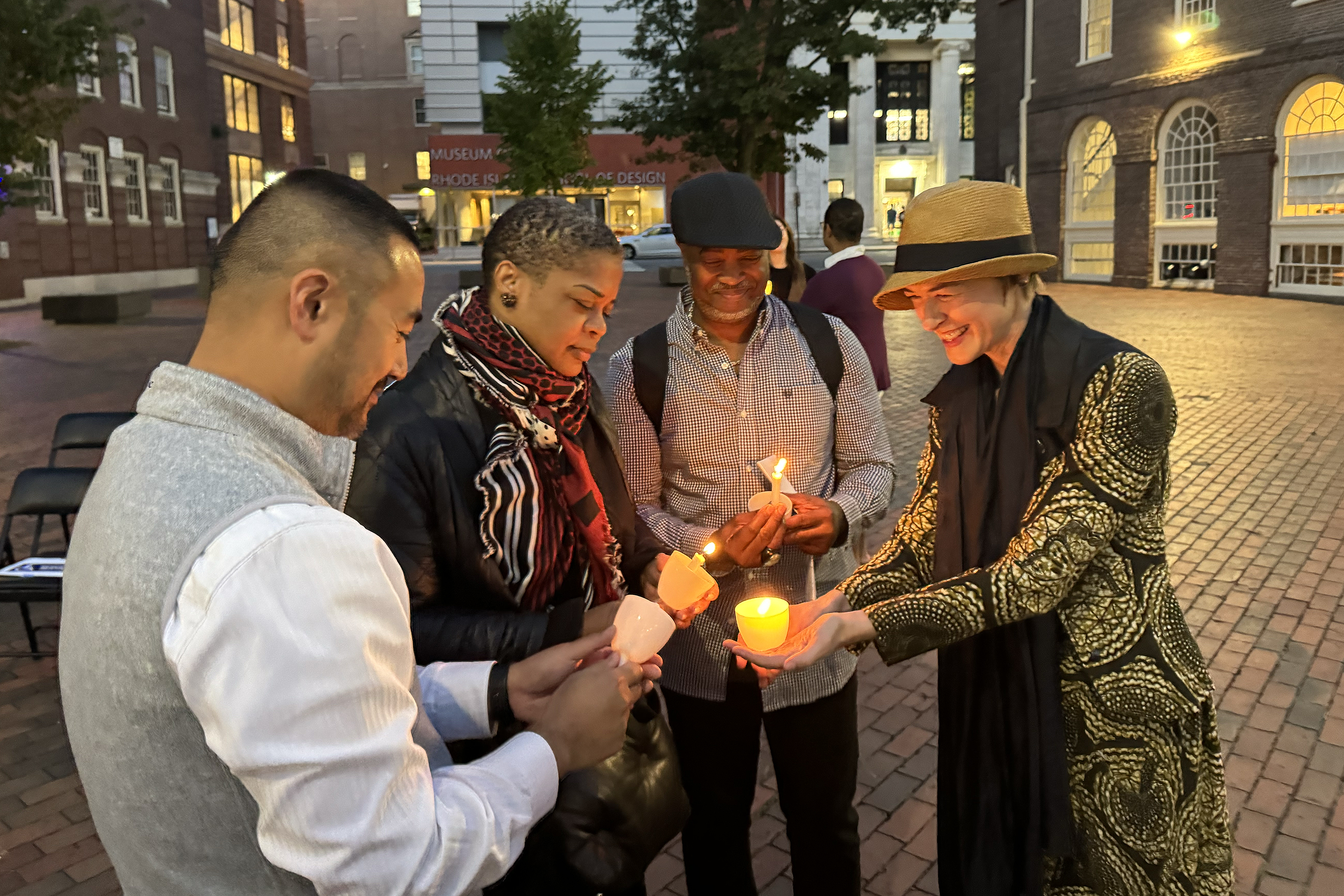 participants at a candlelight vigil in market square