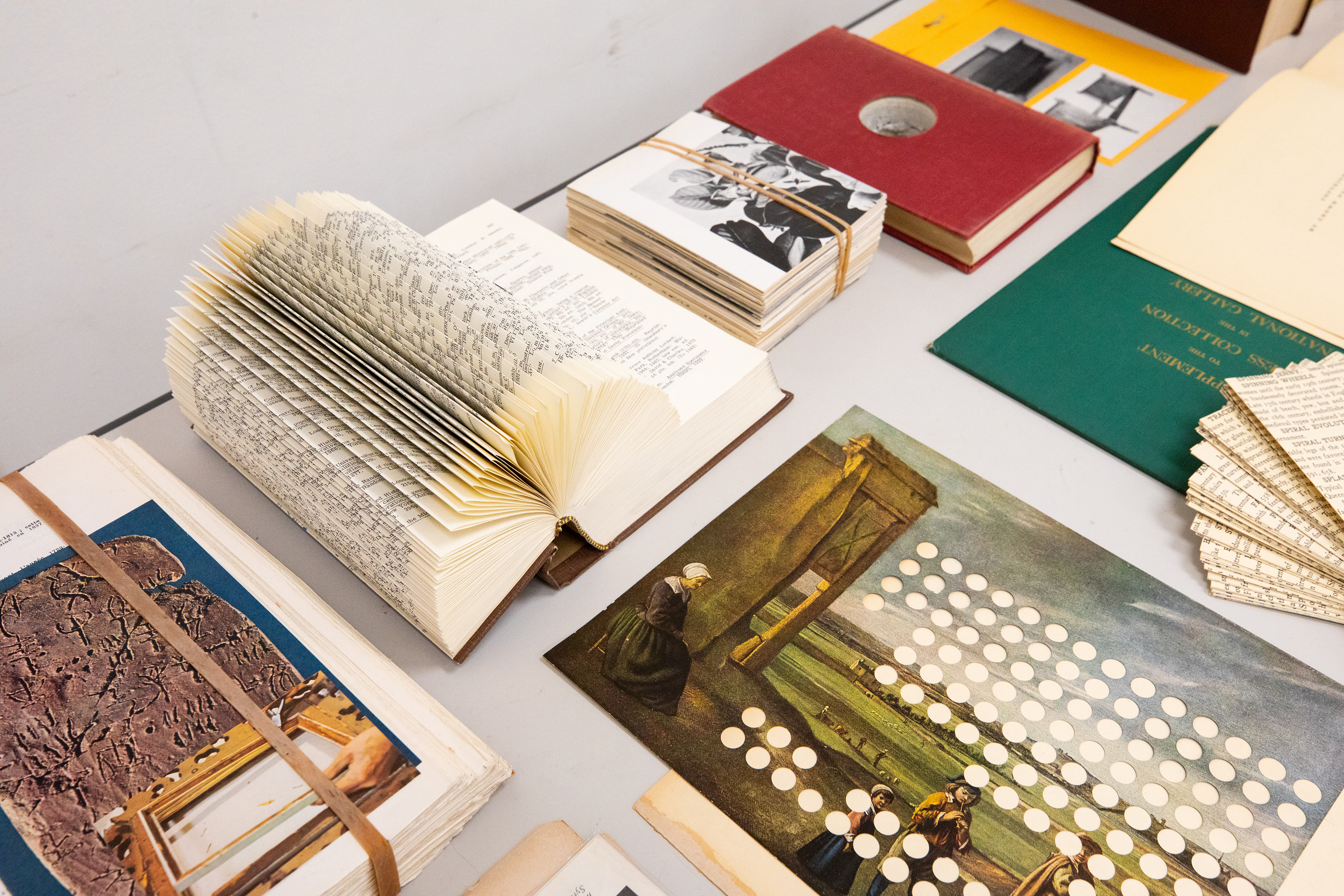 a collection of printed materials reflecting on reassembly