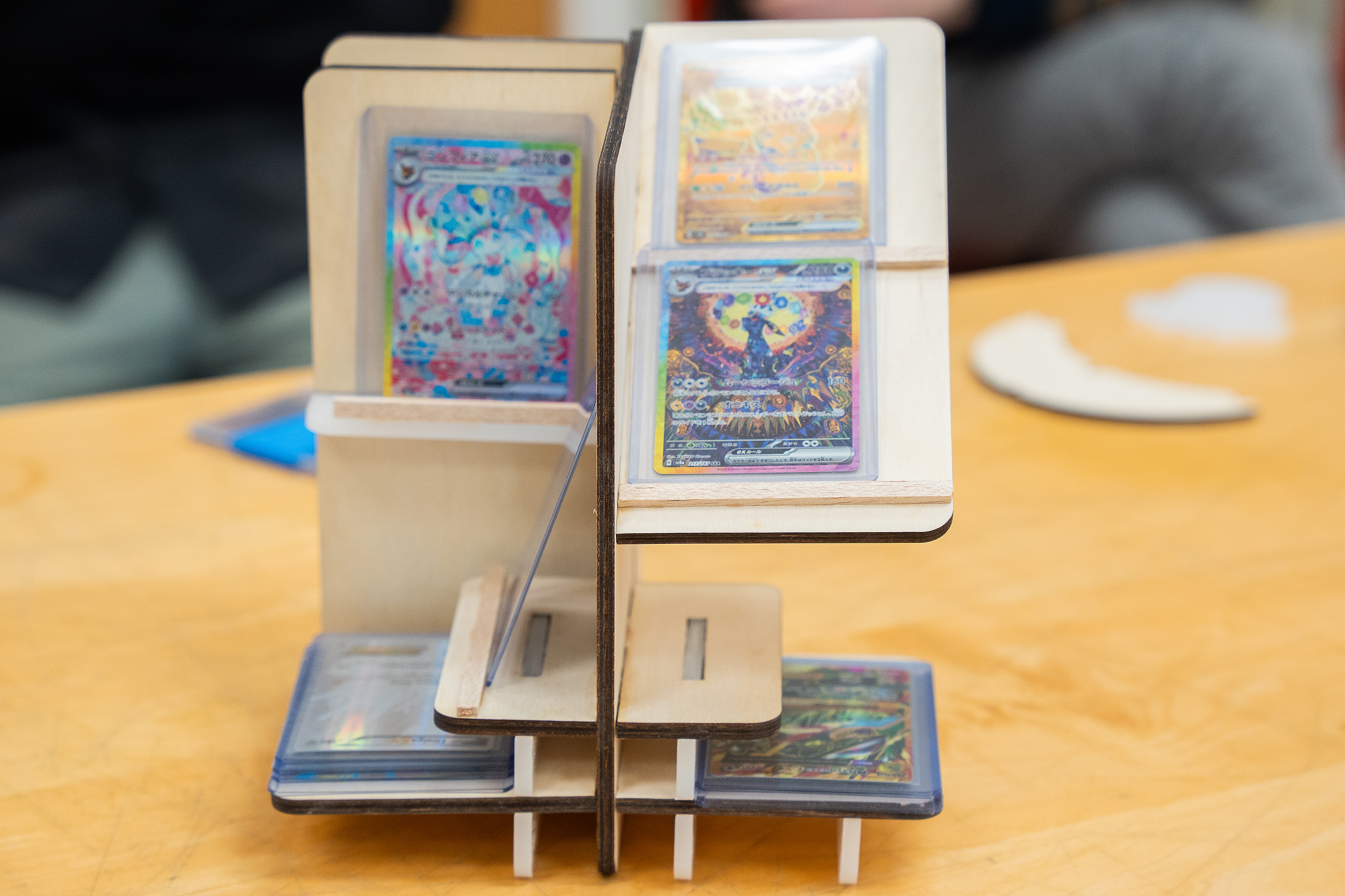 small piece designed to hold Pokemon cards