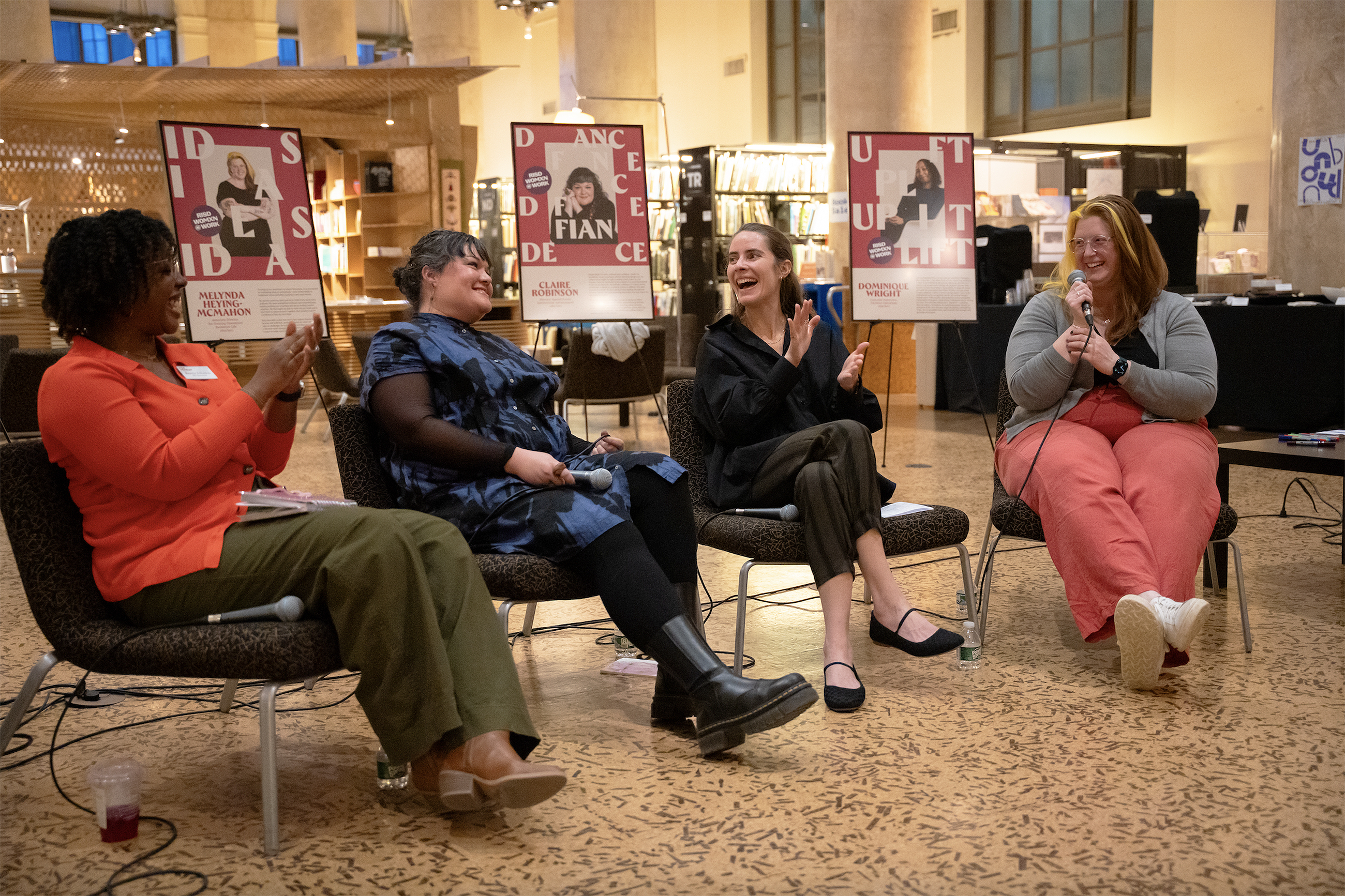 the panelists share a laugh