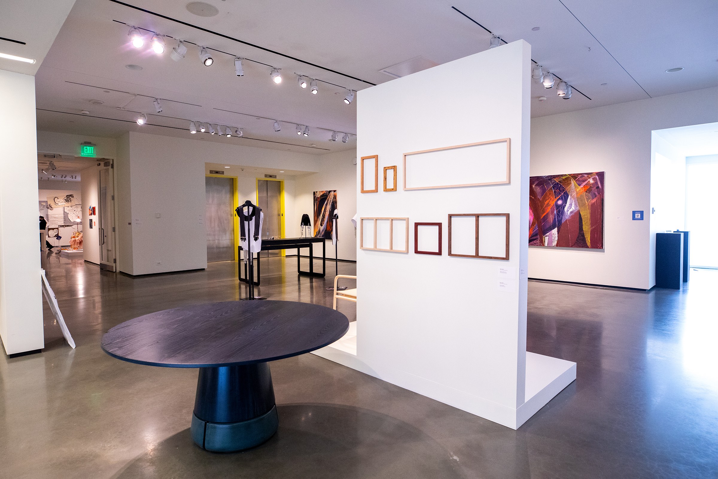 gallery section featuring a round wooden table