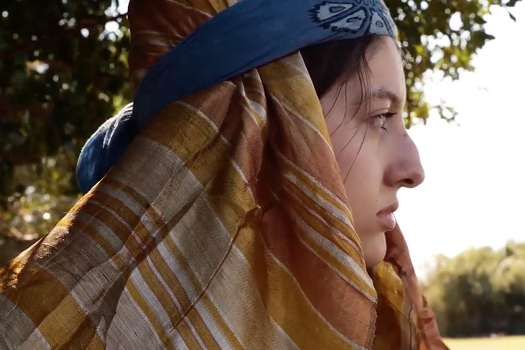 a young Turkish woman in a beautiful head covering