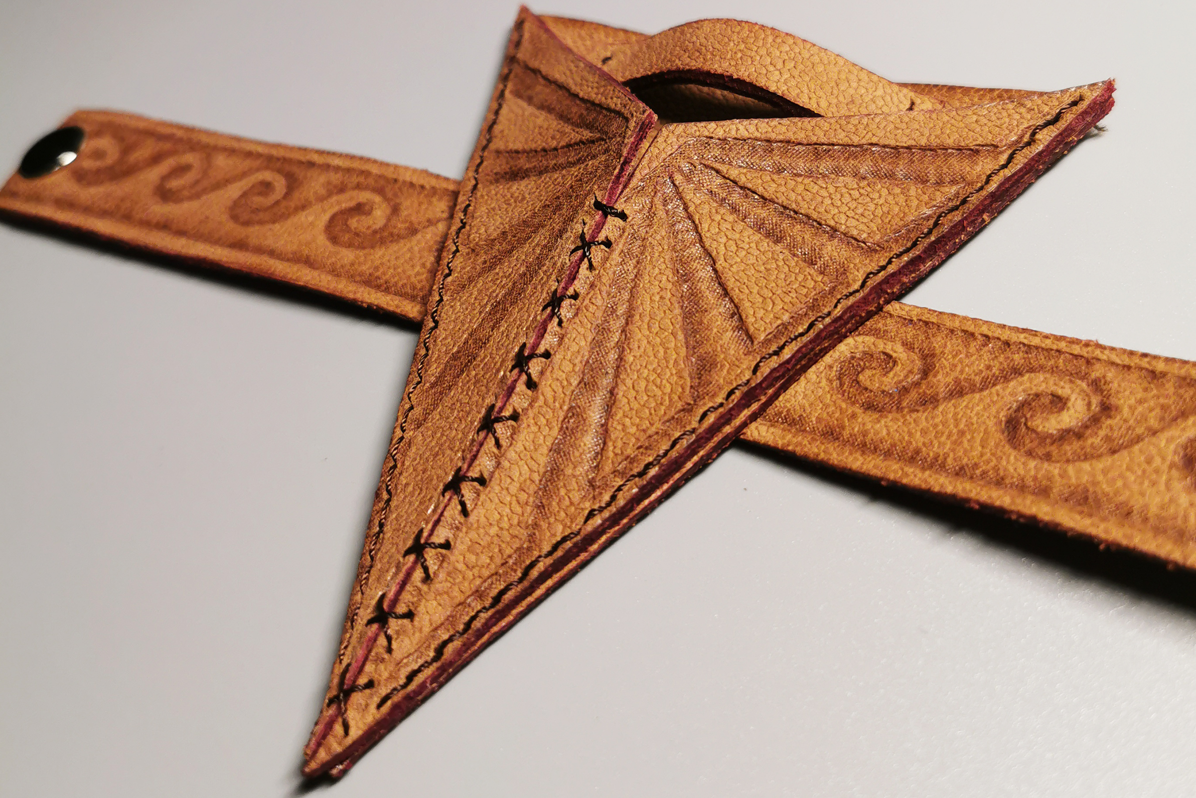 leather object reminiscent of Wonder Woman gear