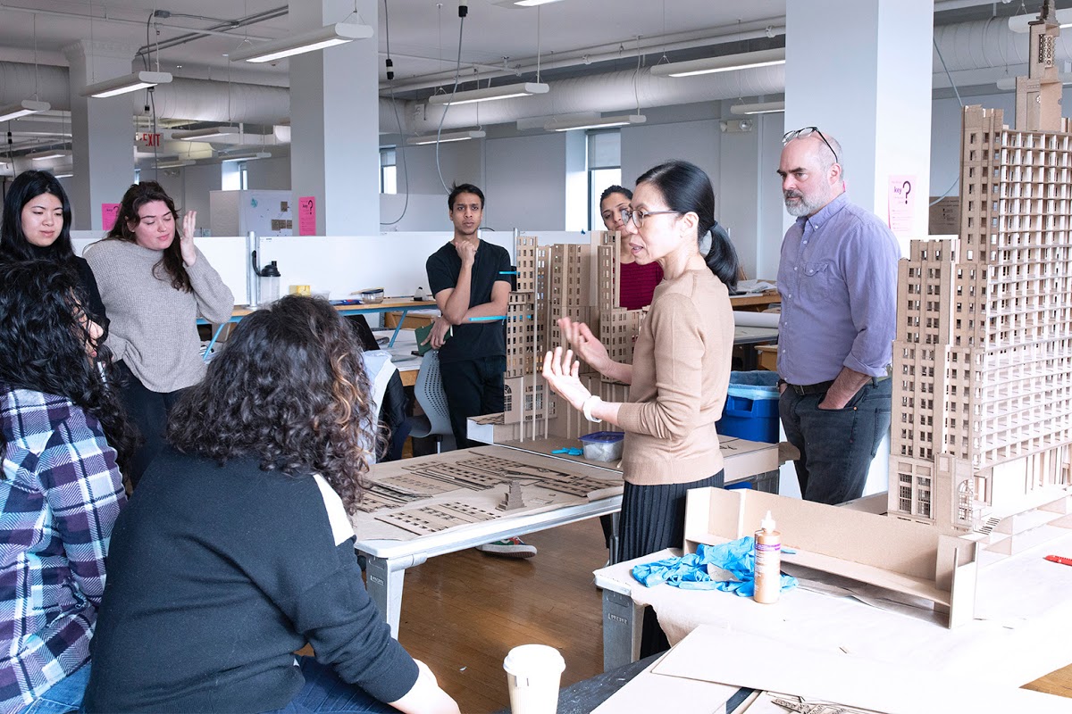 Architecture professor and department head, Liliane Wong, discusses adaptive reuse strategies with students.