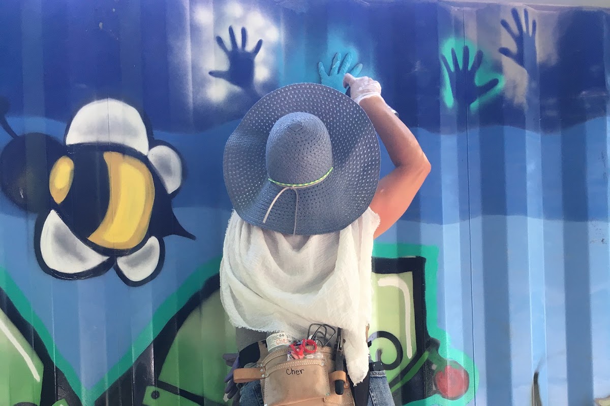 Eli Kauffman 21 PT worked with community members to create a series of colorful murals