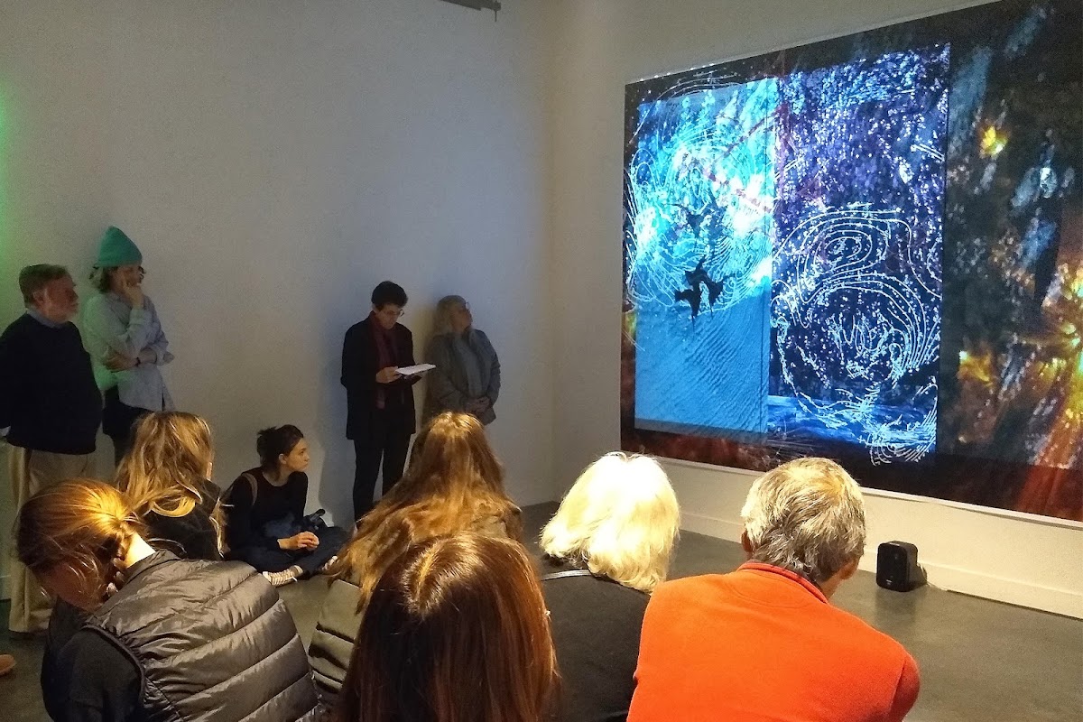 Visitors take in Eclipse Phase, a powerful piece by alumna Deborah Cornell 69 PT