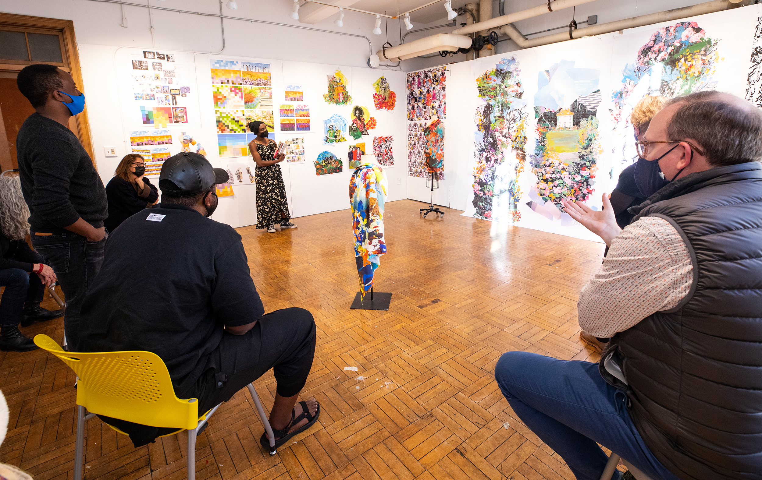 a Textiles student presents work in crit