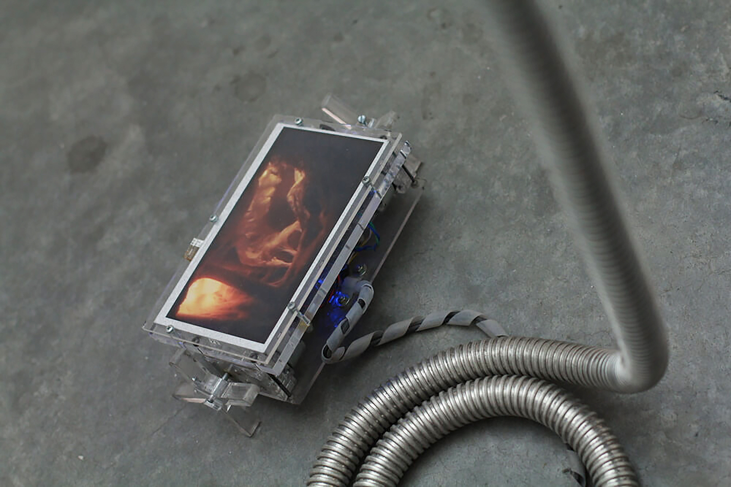 an image displayed on a small metal box