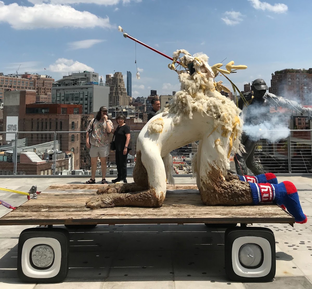 Very large sculpture that expels a cloud of gas, as part of by Nicole Eisenman 87 PT's Procession