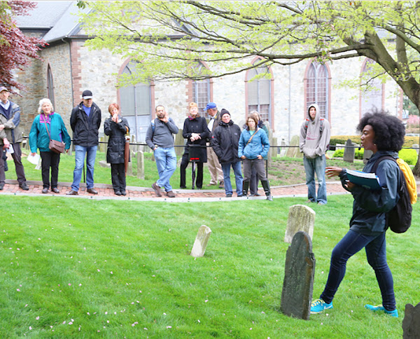 Center for Reconciliation Program Director Elon Lee Cook leads a slavery walking tour