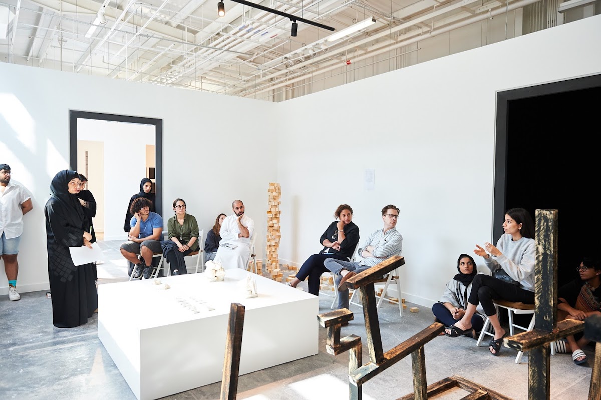 Professor Anais Missakian 84 TX participates in a SEAF critique in Abu Dhabi