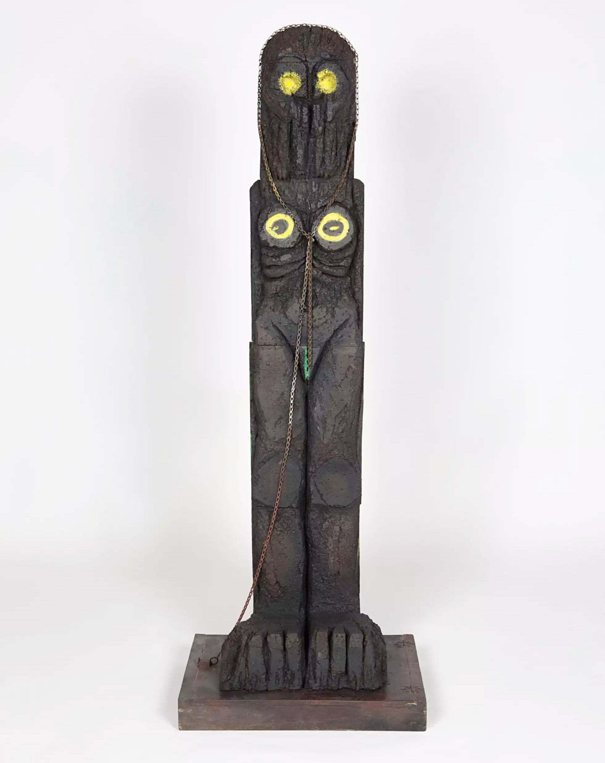 tall standing figure in bronze