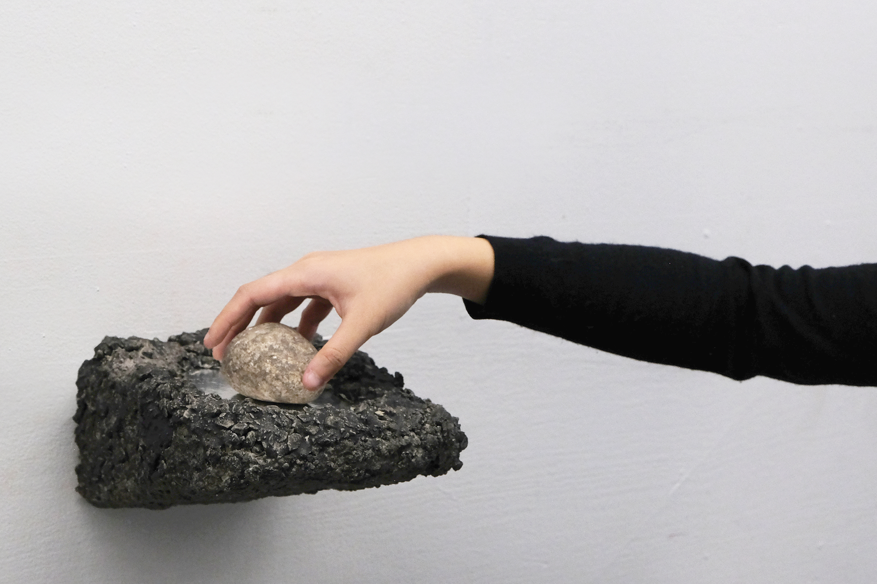 sculptural piece mounted to a wall