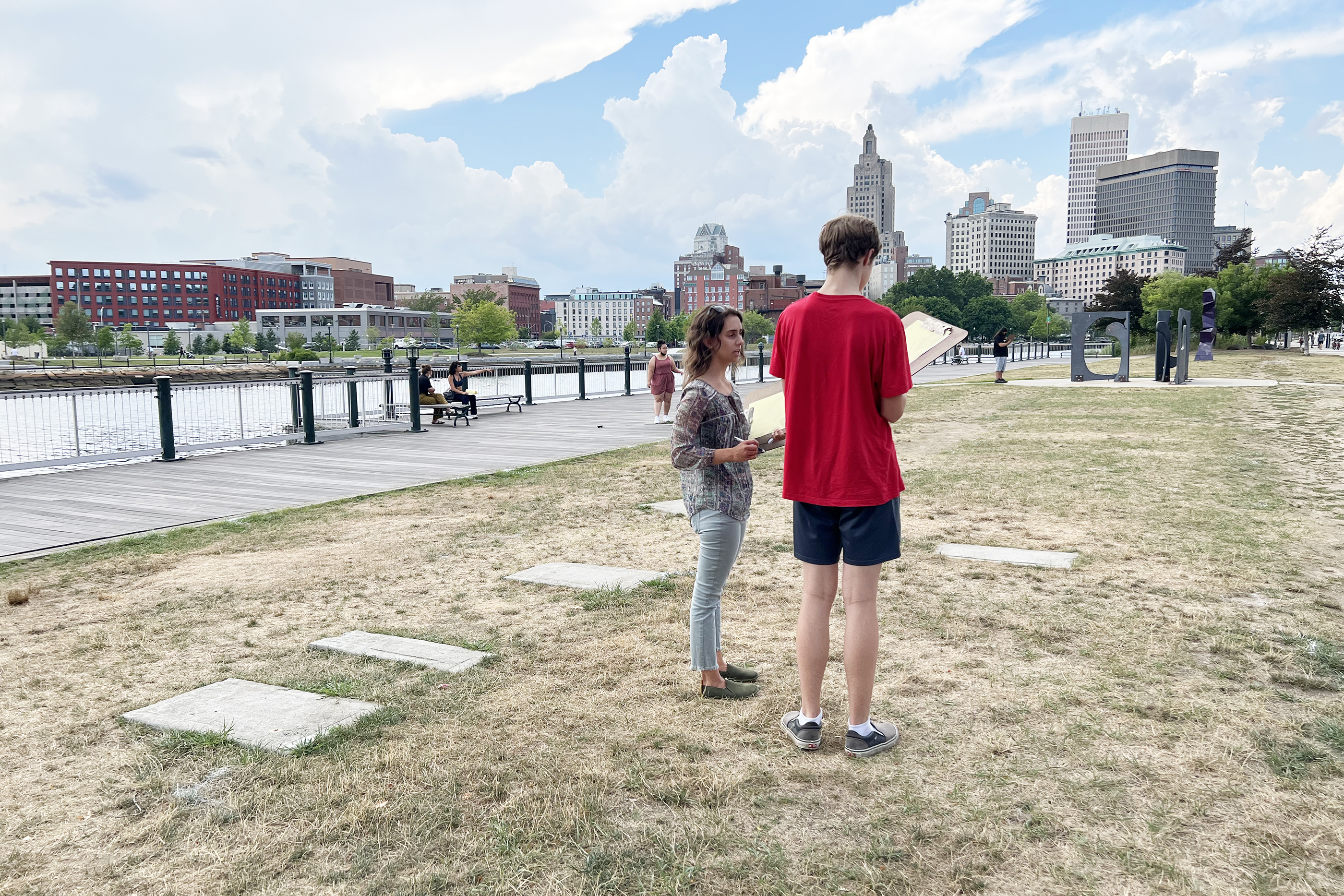 Alexis Violet confers with a POD student