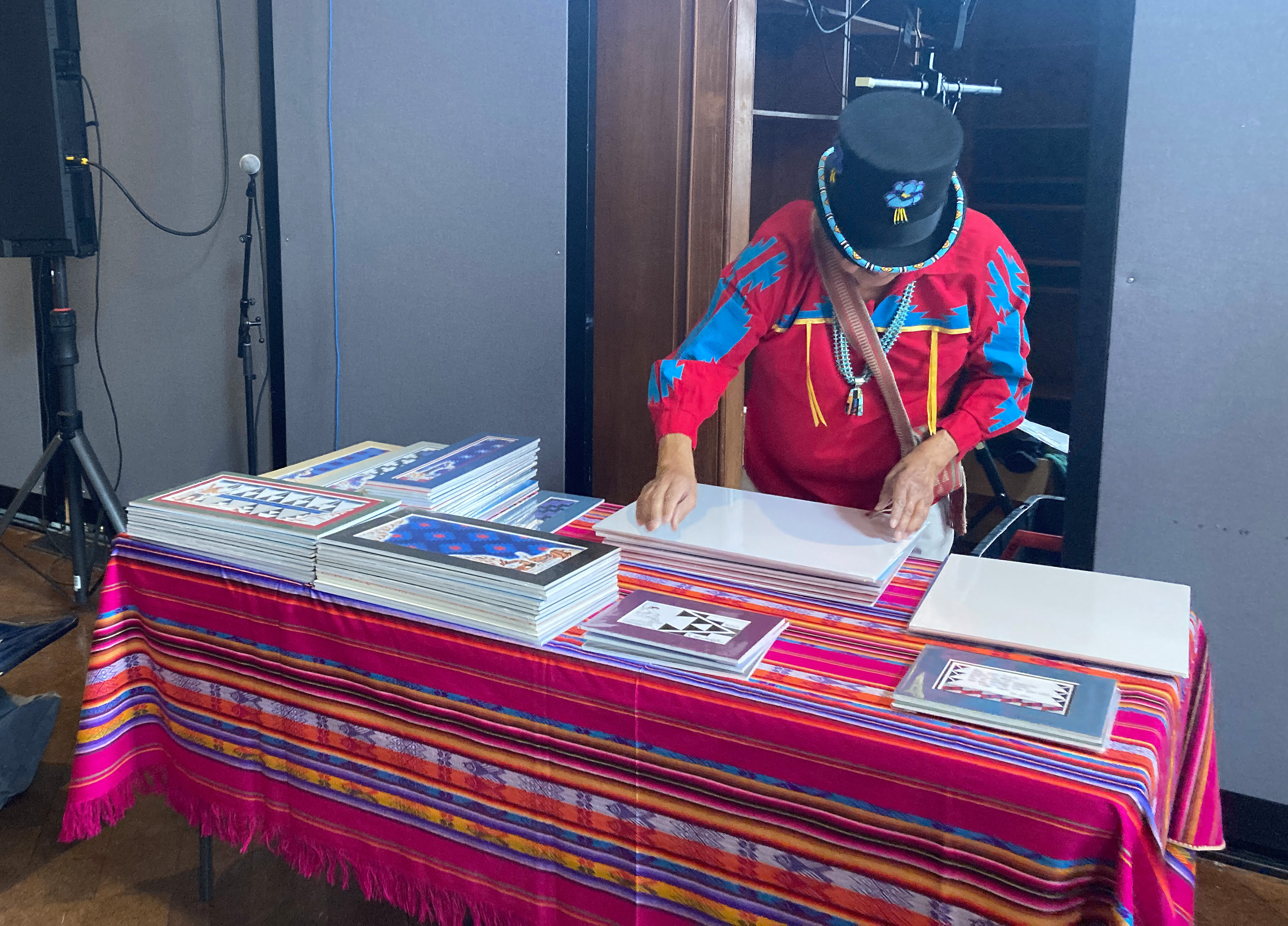 Gary Keene lays his prints out on a table in the College Building
