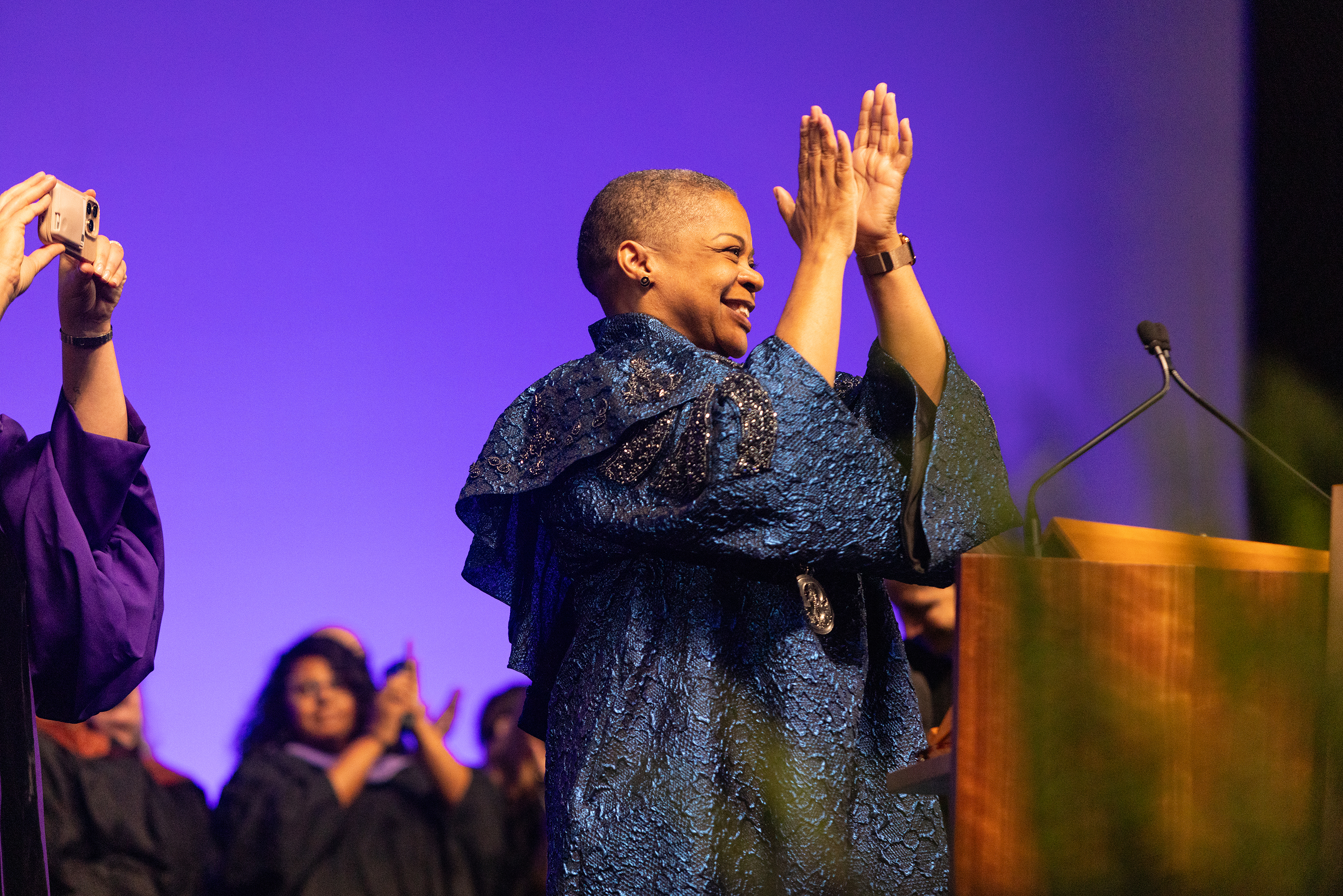 President Crystal Williams applauding at Commencement 2025