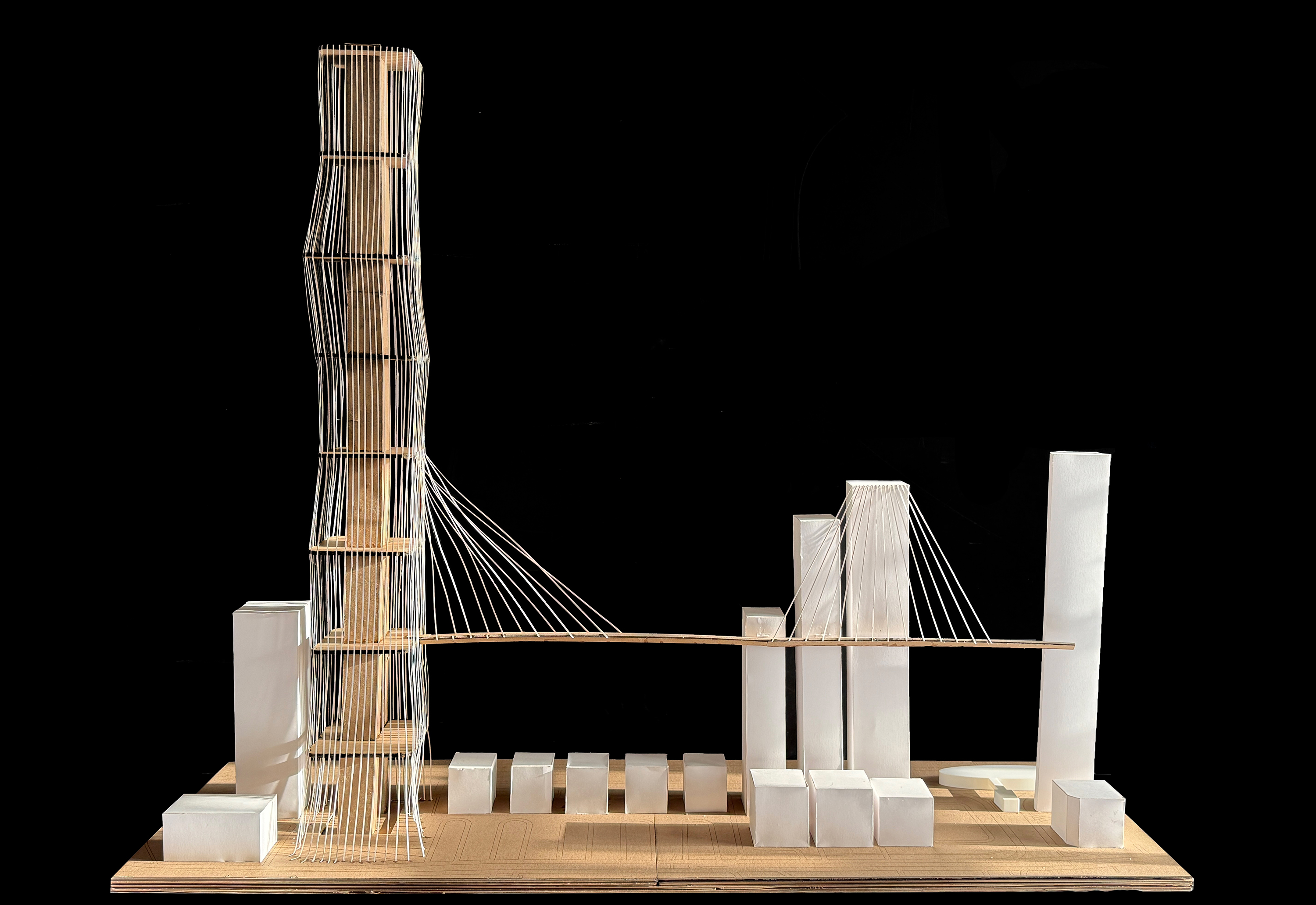 tall tower model showing cantilevered connection to adjacent buildings