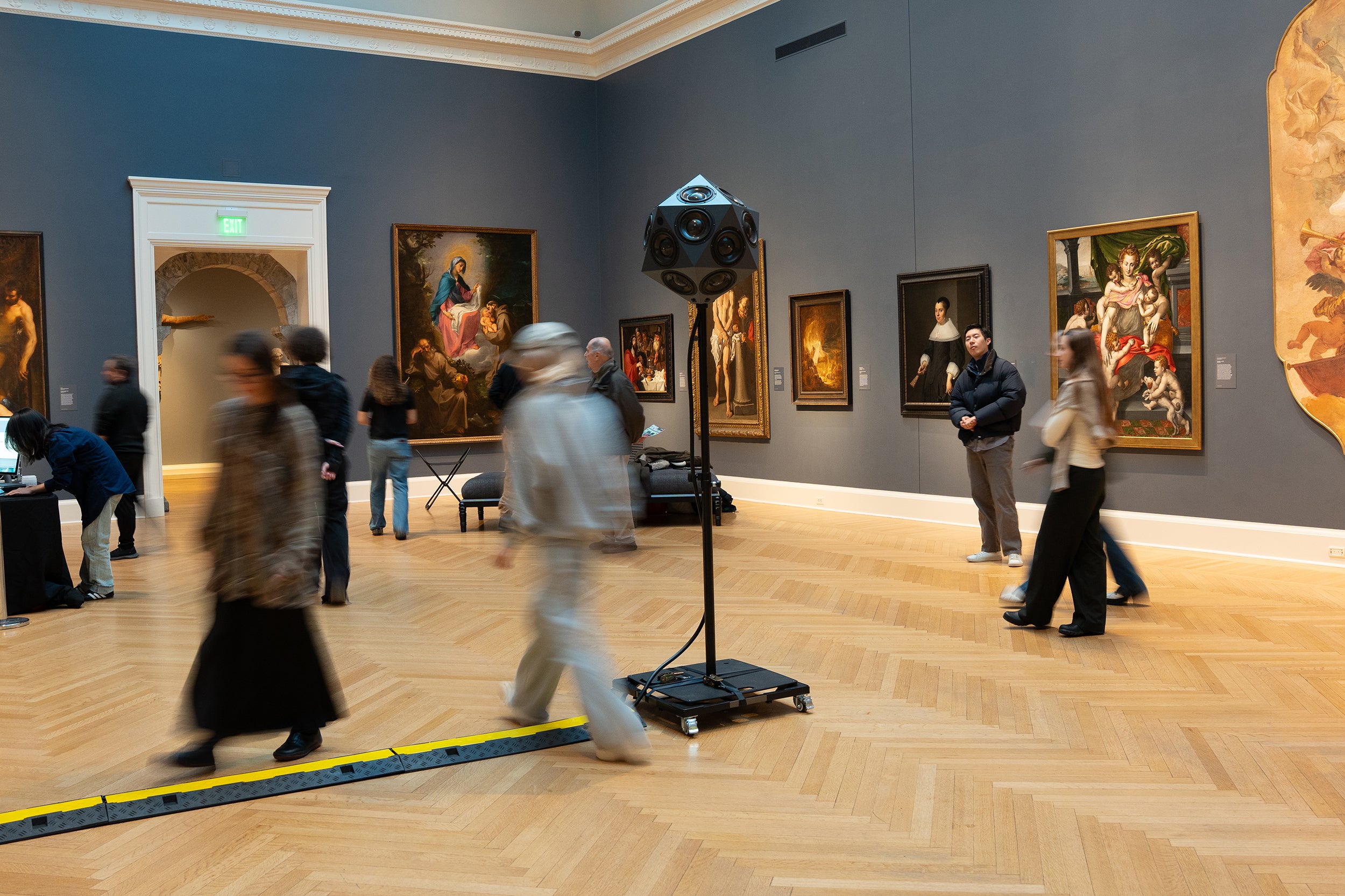 listeners move through the Grand Gallery to hear how the sound is reflected