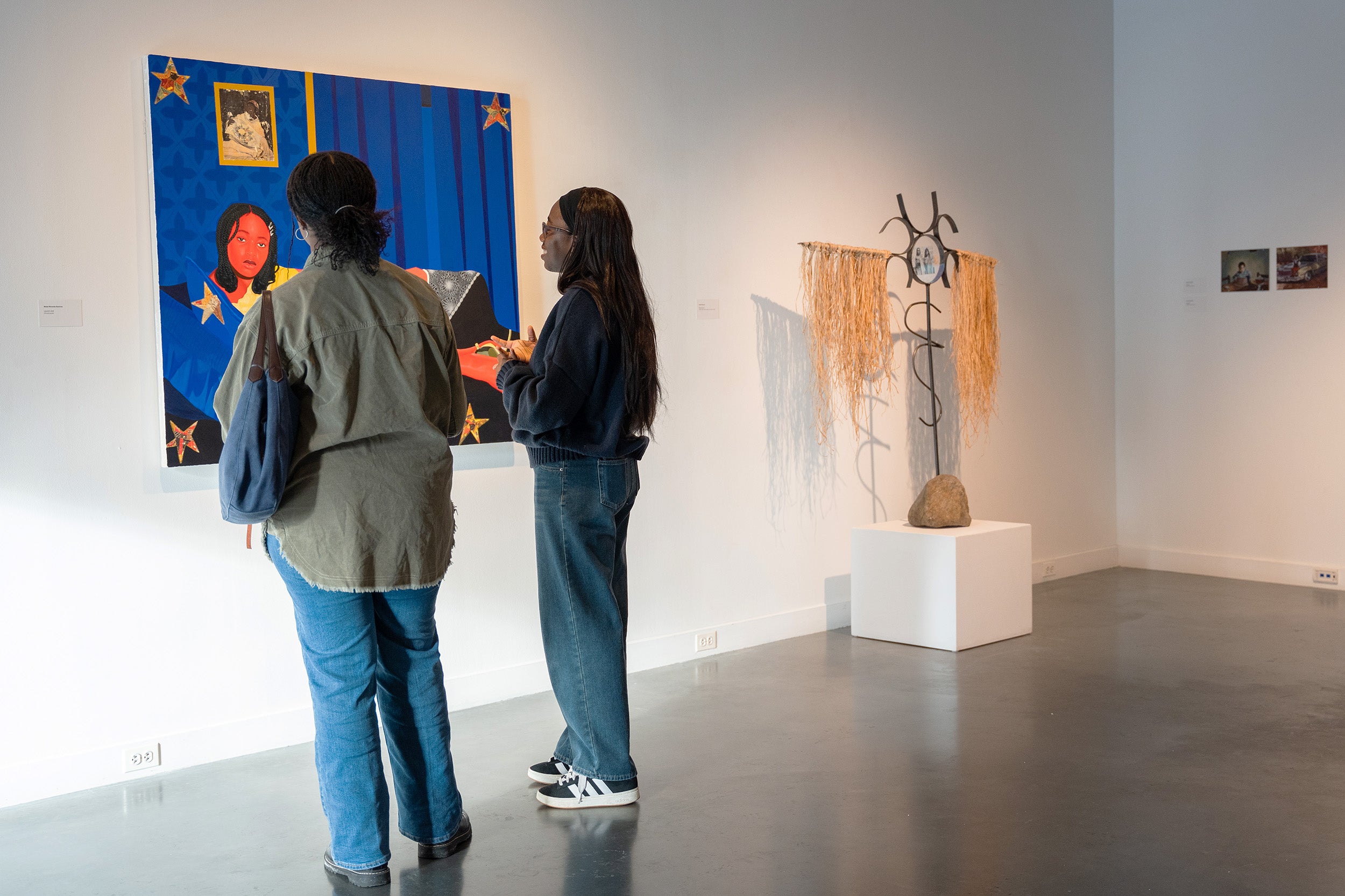 visitors explore the show