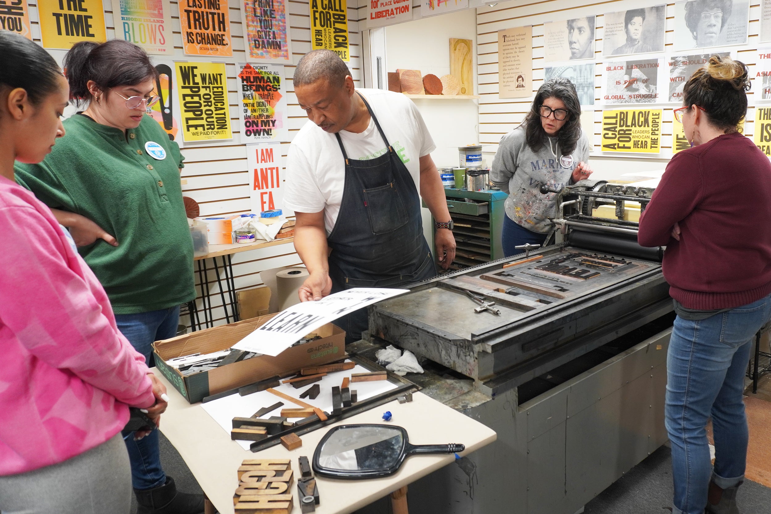 Bidon works with a group of teachers in his studio