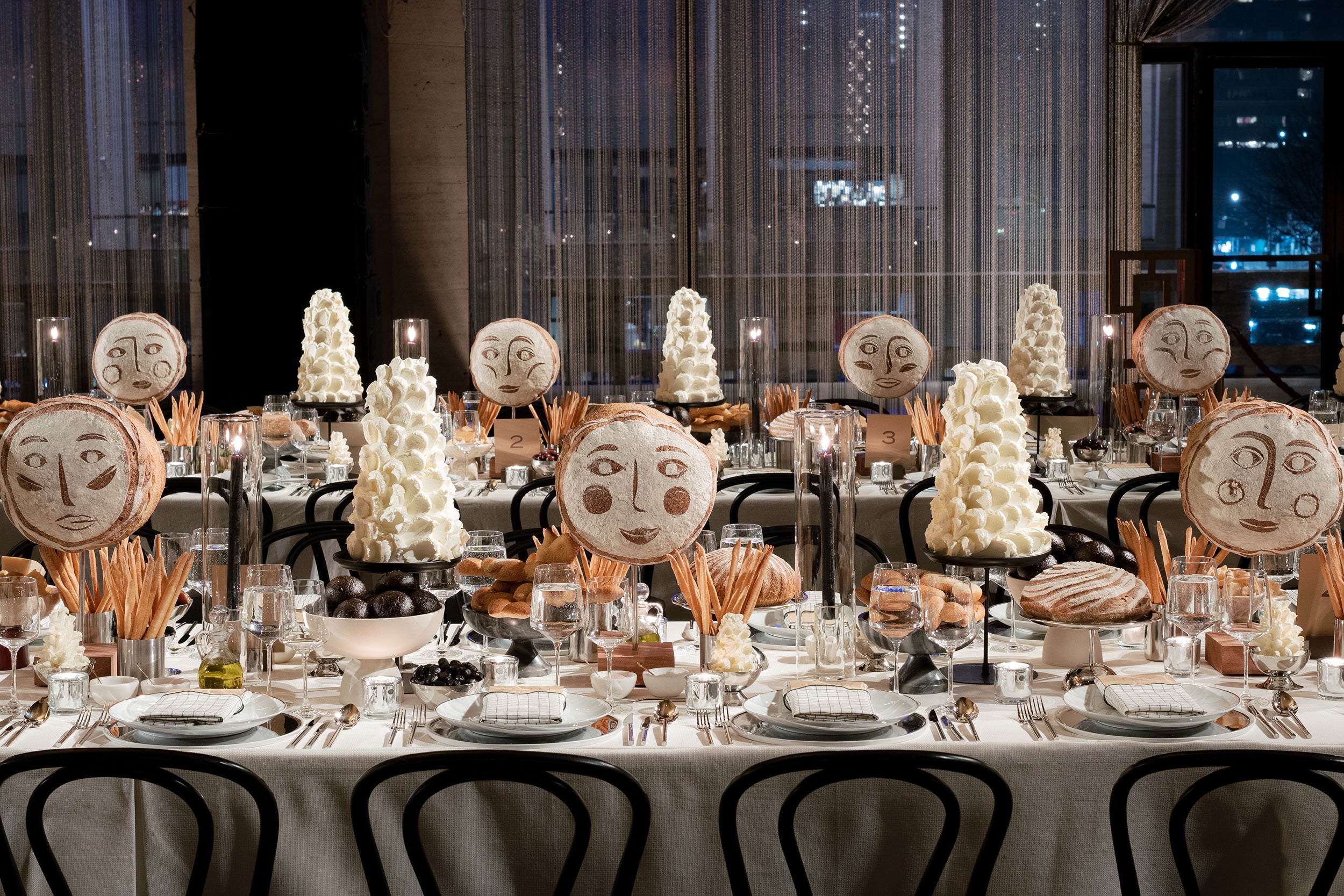 edible centerpieces featuring sourdough rounds with faces
