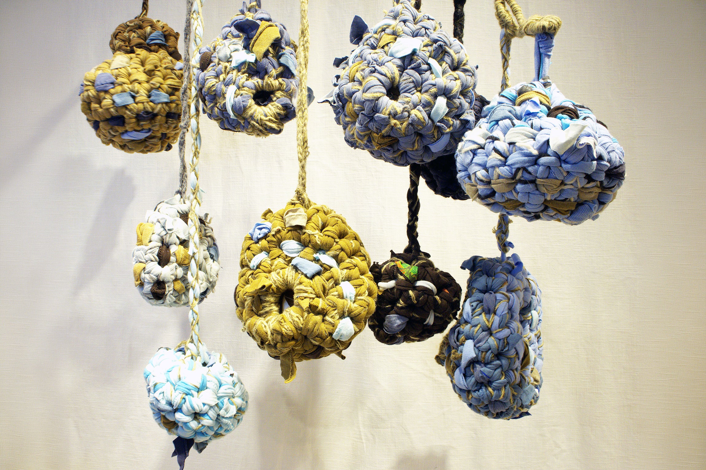 textile-based mobile in blues and ochers