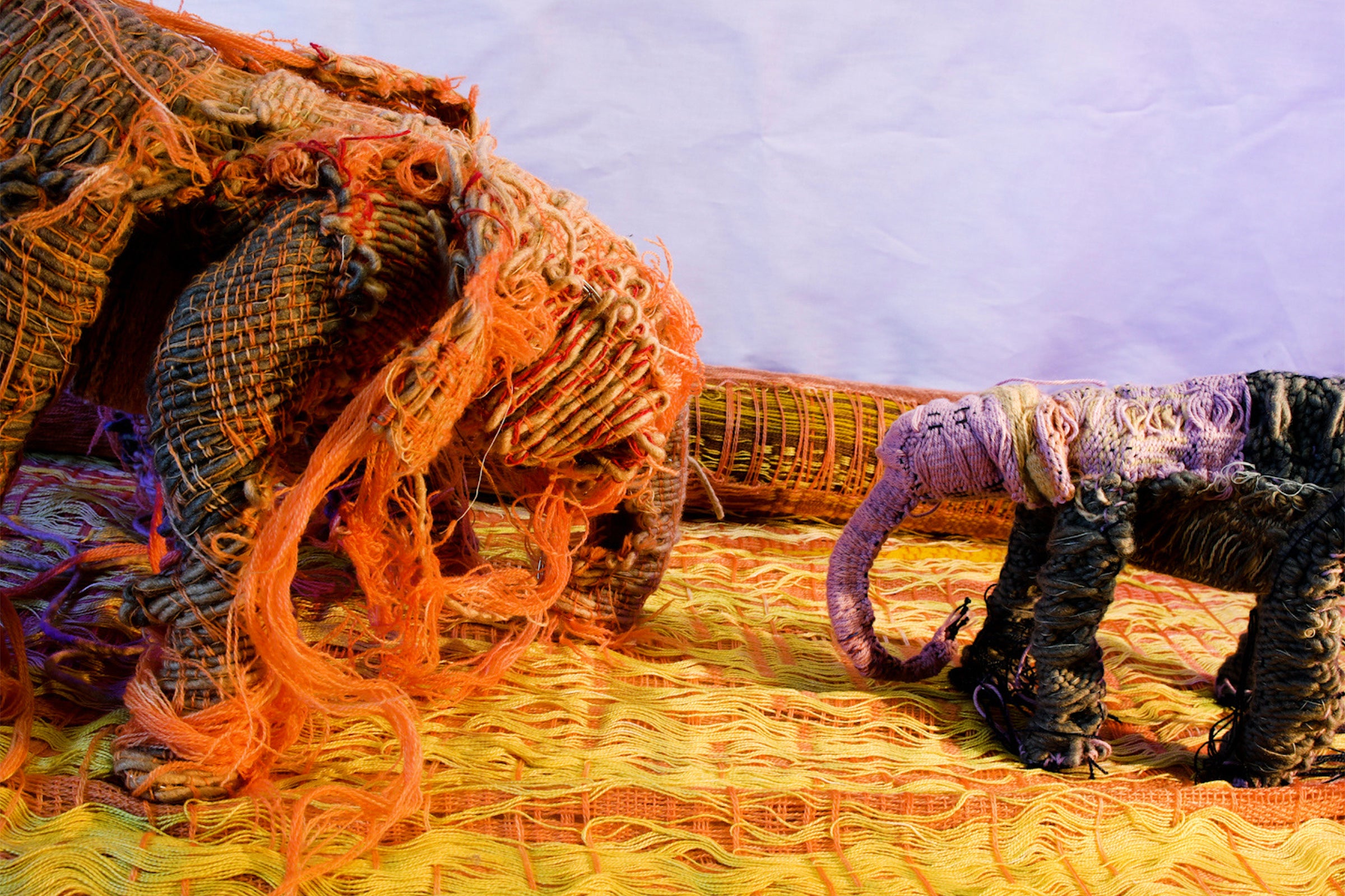textile elephants in conversation