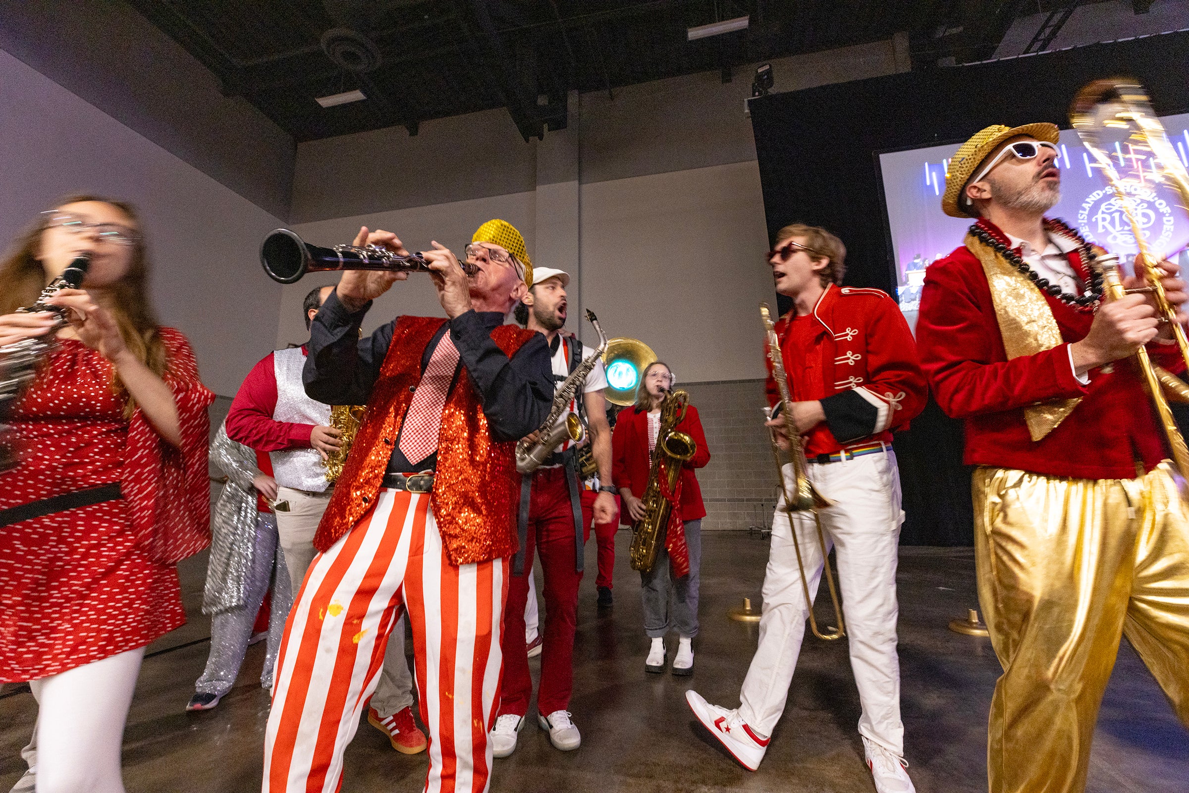 The Extraordinary Rendition Band plays as students enter the convention center