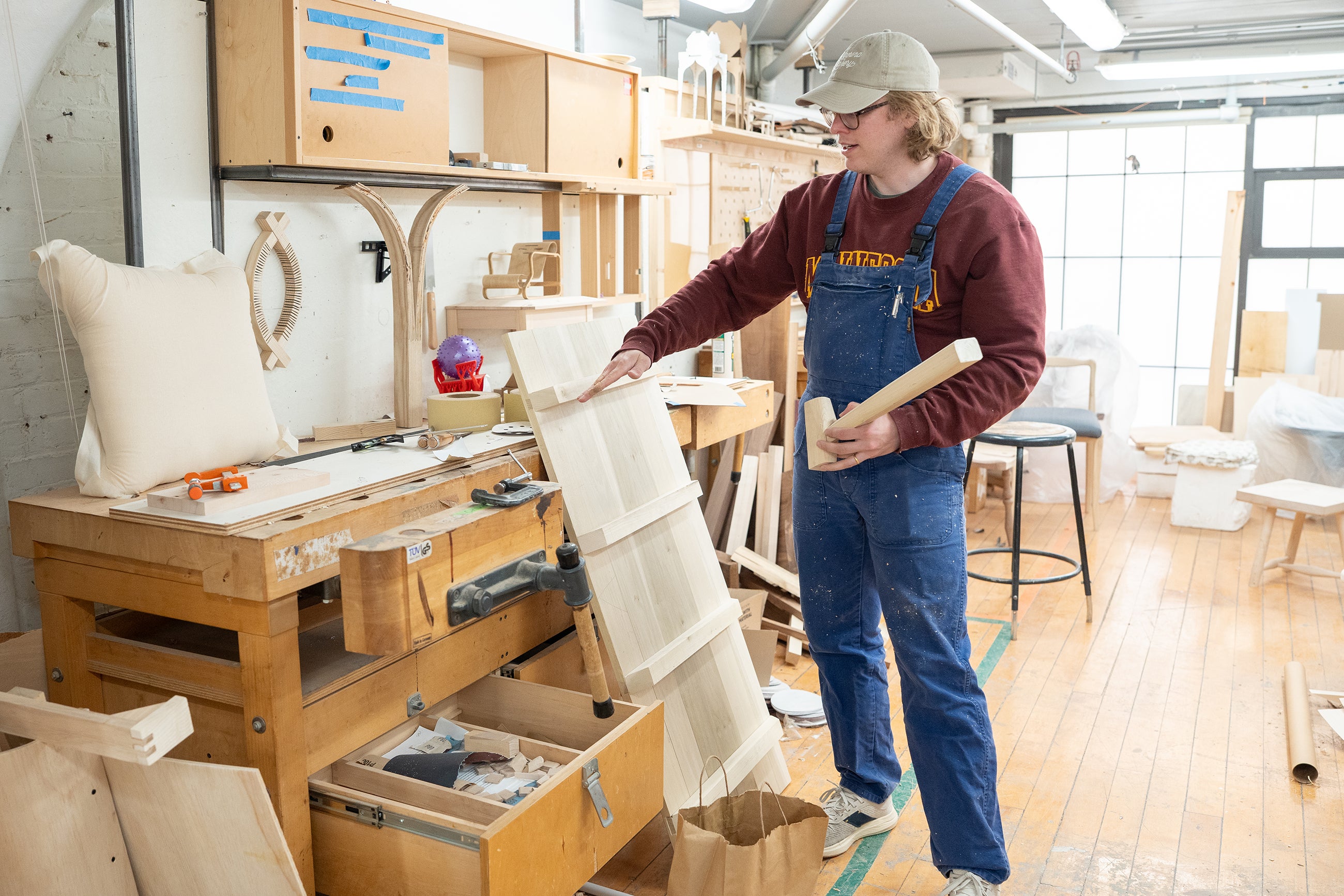 McKenzie Robida discusses a table in progress