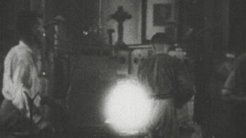 still from a black-and-white glass-making film