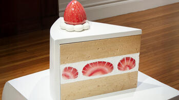 object that resembles a slice of strawberry shortcake