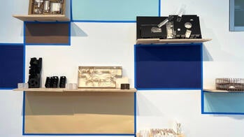 projects displayed on a wall installation