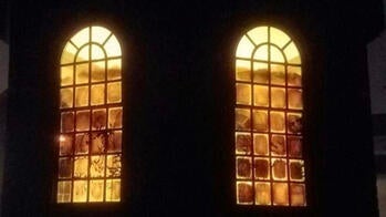 beautiful arched windows lit from the inside