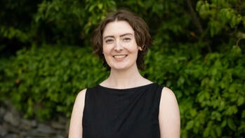 Claire Wyman smiling outside