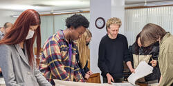 students review plans and drawings in RISD's Archives